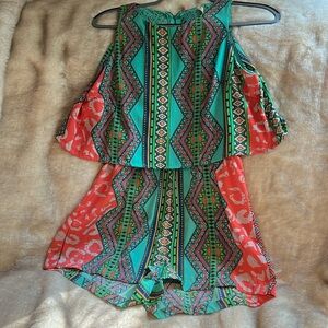 Adorable summer Romper by Lovemarks with Gorgeous geometric colors.